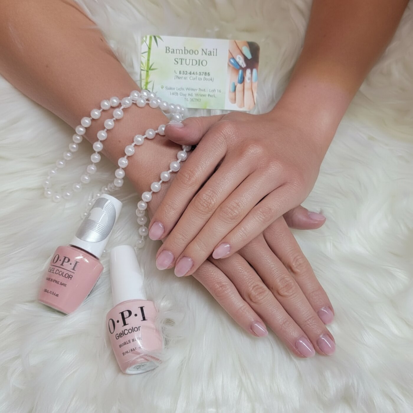Natural pink gel manicure with Bamboo Nail Studio business card and OPI polish
